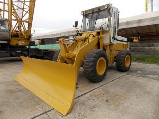 <a href='product.php?qid=36695' style='color:white;text-decoration: none;'>รถตักล้อยาง KOMATSU-520 : <span class='text-info'><strong>Read More</strong><span></a>